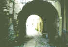 Via della Portella - Arco del Borgonuovo